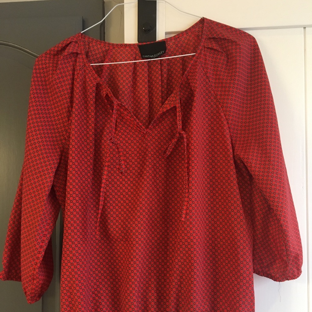 Red patterned blouse with tie
